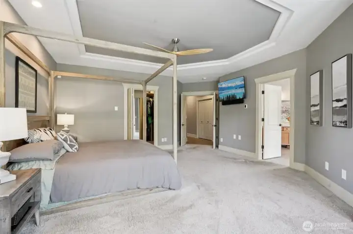 Main-floor retreat with double fireplace and spa-inspired ensuite