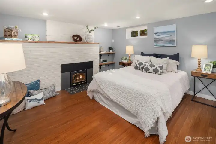 A fantastic primary or guest suite! This is technically a bonus room downstairs, connected to the 5th bedroom (with new conforming egress window) and a 3/4 bath.