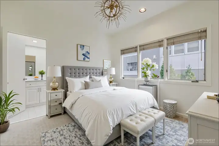 Full bedroom with access to a full bathroom.