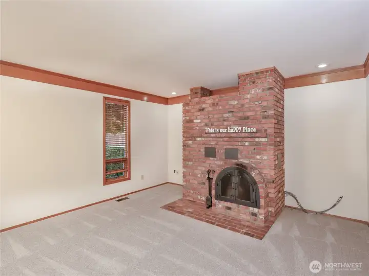 This Russian Fireplace is AMAZING! Pellets are fed thru garage.. Heats the Main floor w/ Ease!