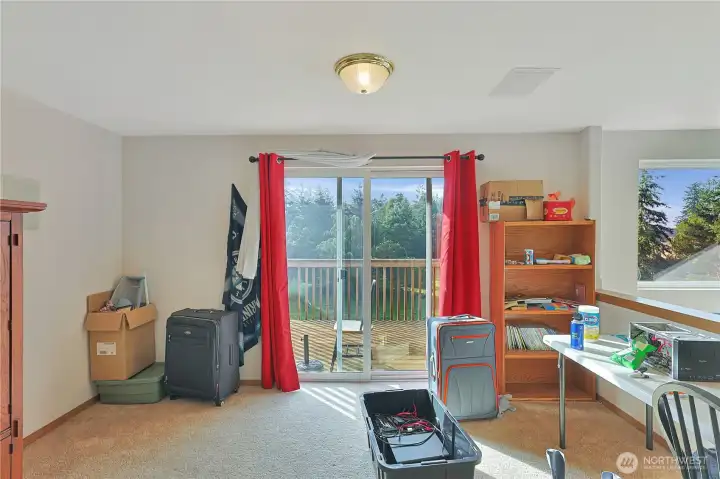 Deck off the upstairs bonus room with a beautiful view