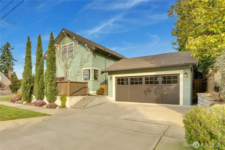 The detached two-car garage adds both charm and convenience, providing extra storage and privacy for the back yard.  There is ample guest parking along wide and welcoming streets.