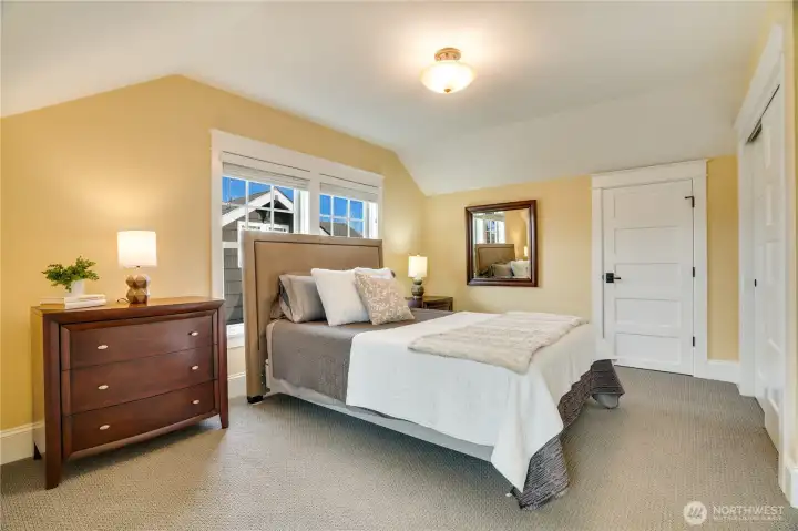 One of two bright upstairs bedrooms with great closets and bonus storage tucked into the finished eaves. Perfect for guests… or your next creative adventure.