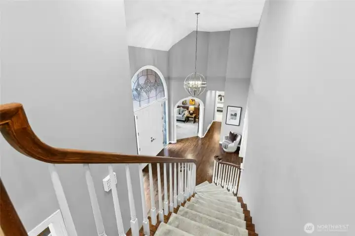 A grand, light-filled entry makes a striking first impression.