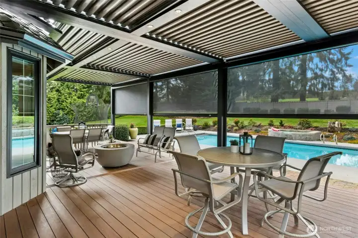 PergolaX system keeps things dry year-round. Retractable screens for privacy.