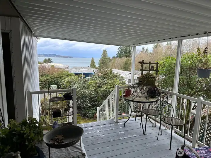 Covered deck equal's year long use. Have your morning coffee, entertain, watch the sunsets, feel the peace and quiet.