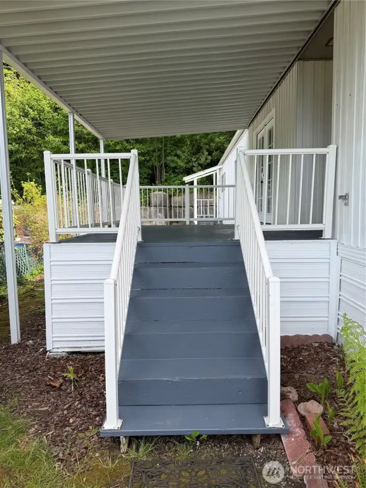 Steps to spacious deck, deck is also accessed through french doors previous photo.