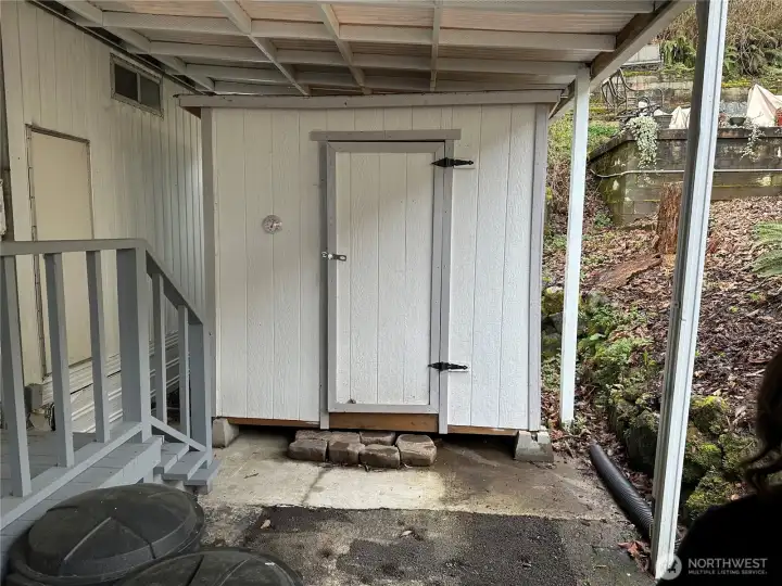 End of carport a large storage was built.