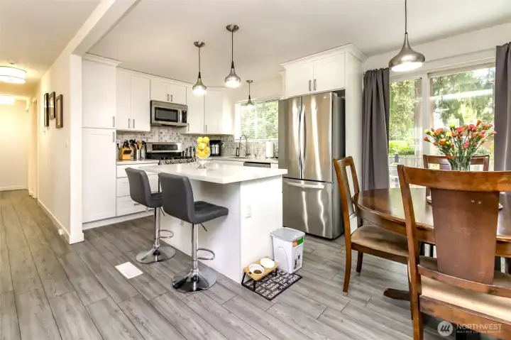 Spacious Light Filled Kitchen! Newer LG Appliances, Quartz Counters, Undermount Sink, New Cabinets w/Soft Close!