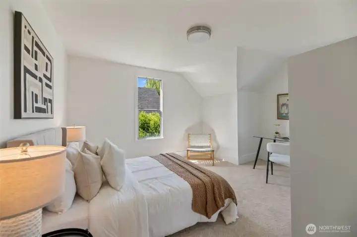 This is a large bedroom or could also be a family room on the 2nd floor Southwest corner of the home.