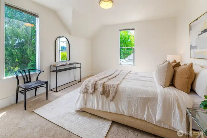 This is bedroom is also very spacious. (3 of the bedrooms can easily accommodate a king size bed). This room is located in the Southeast corner and you can see the Cascade Mountains.