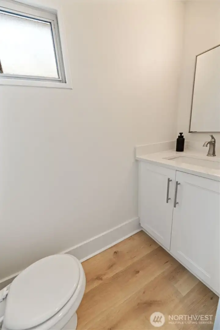 The 1/2 bath located on the main floor is updated as well.