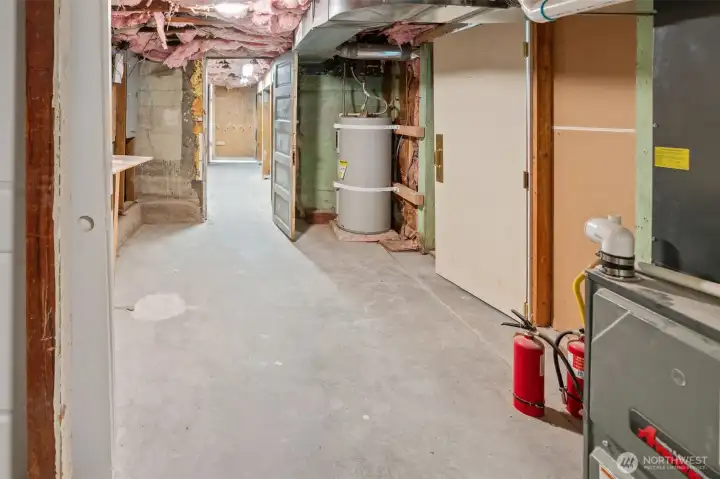 The gas furnace and hot water heater were replaced a few years ago. There is also a work table on the left side of this utility room in the basement. AC can easily be added!
