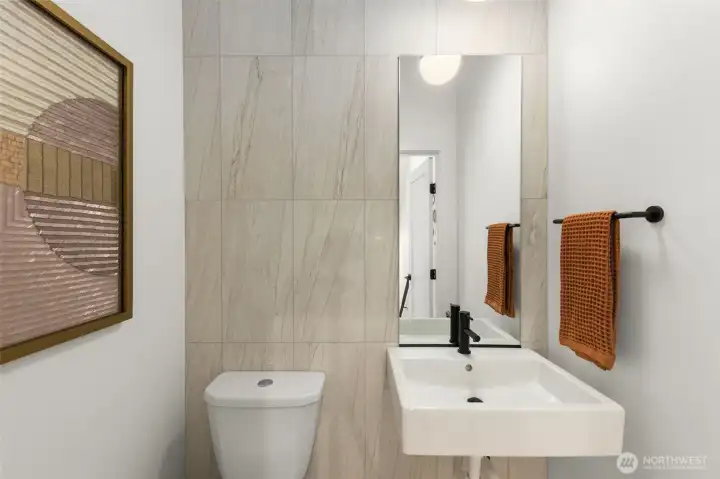 Convenient Powder Room too! Photo is of model home of same floorplan. Color schemes and finishes will vary per plan. Convenient Powder Room too! Photo is of model home of same floorplan. Color schemes and finishes will vary per plan.