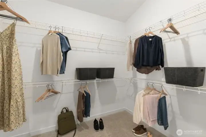 Primary Suite walk-in closet! Photo is of model home of same floorplan. Color schemes and finishes will vary per plan. Primary Suite walk-in closet! Photo is of model home of same floorplan. Color schemes and finishes will vary per plan.