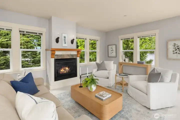 A cozy gas fireplace serves as a warm and inviting focal point in the great room.