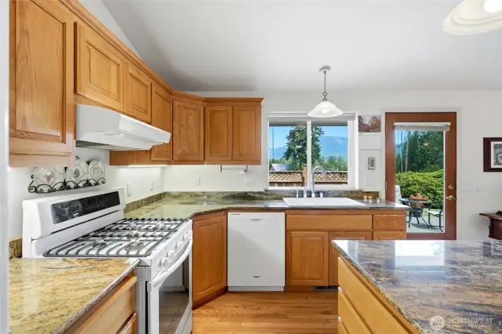 Granite slab counter. All appliances stay