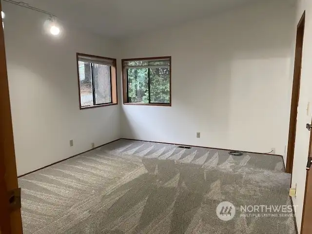 Primary bedroom with brand new carpet