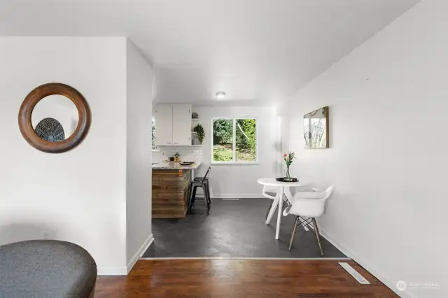 Beautiful transition to the daily eating area and kitchen.