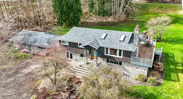 Two Homes in One~Multi*Generational Lifestyle OR Rental Income?~Room for a Crowd without Being Crowded~Entertainment Sized Deck on the North end of the Home & a New Roof on the Home & Garage~