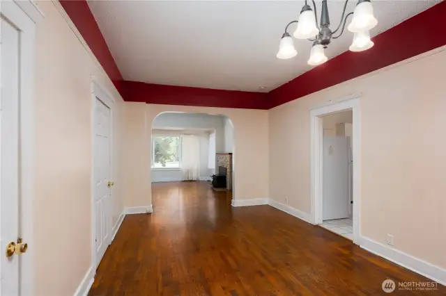 Another view of downstairs dining area and living room. Kitchen is off to the left.