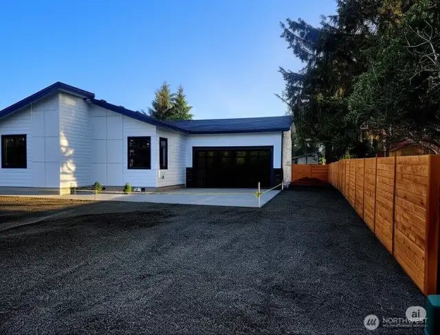 Garage door is AI generated. Similar one will be installed soon.