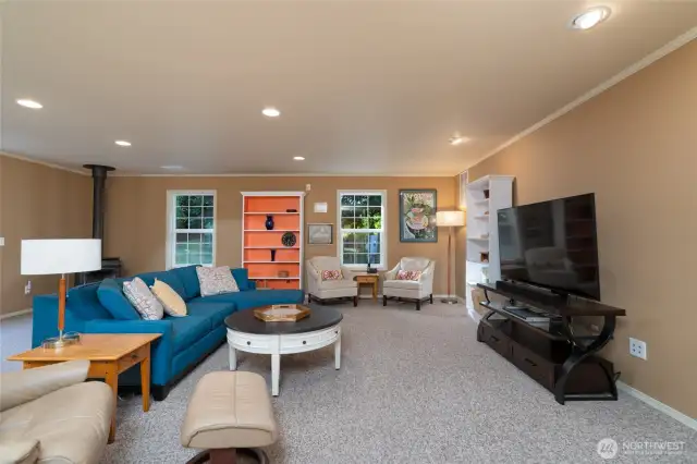 This spacious first-floor bonus room offers flexible use, with great potential to be converted into a downstairs primary suite or a comfortable mother-in-law (MIL) suite, providing added convenience and privacy.