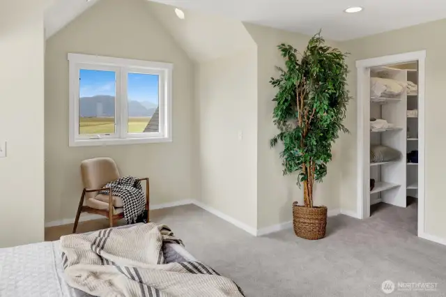 Another view of the primary suite. Note the double closets