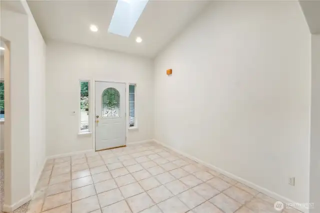 Large Entry Way, Skylight & vaulted ceiling