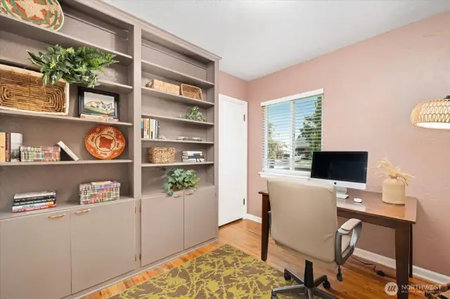 Bedroom with built-ins and closet
