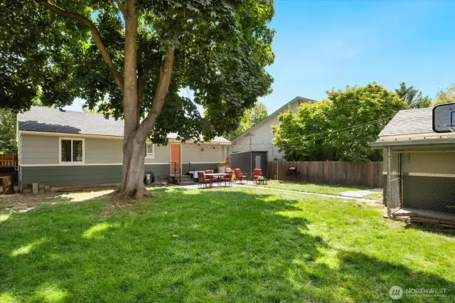 Backyard view of home from fence
