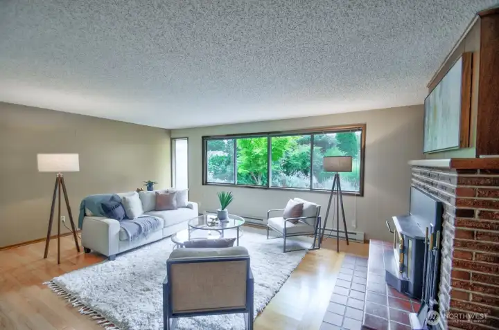 The living room faces the garden for green views and sunshine.