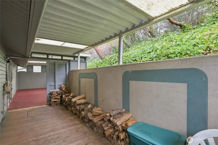 Back deck includes covered storage area.