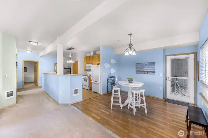 This unit has an outside door off the patio and into the dining area, which serves as a convenient private entrance.