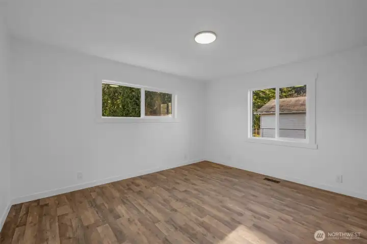 Bedroom number two is more spacious and has an entire wall of built-ins as well! Come check them out in person!