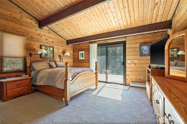 Primary bedroom with slider to deck