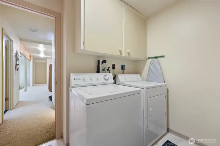 Washer Dryer included in laundry room