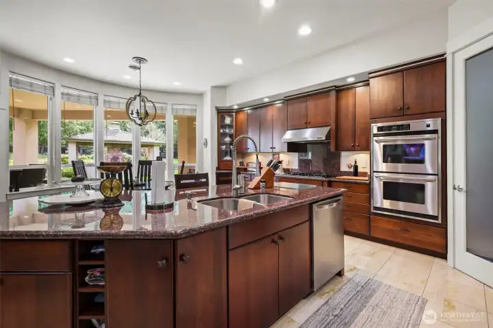 All high end custom appliances Custom cabinets and granite counters. Truly a chef's kitchen with abundant counter space and storage.
