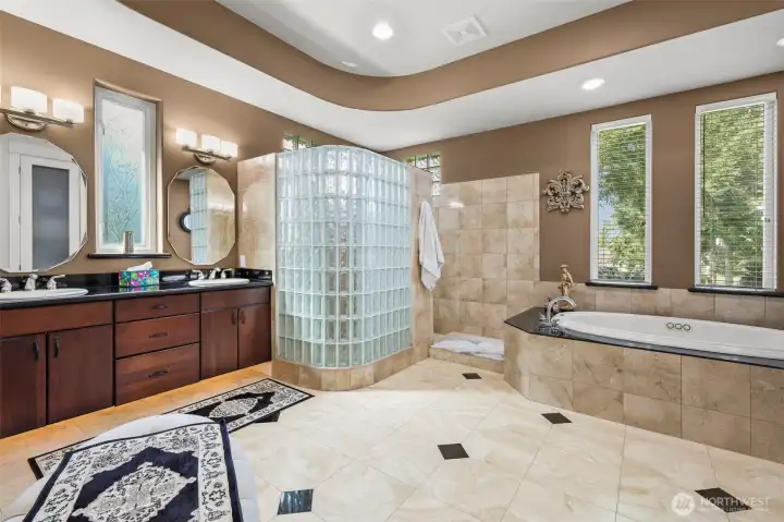 Luxury primary suite with 2 walk-in closets