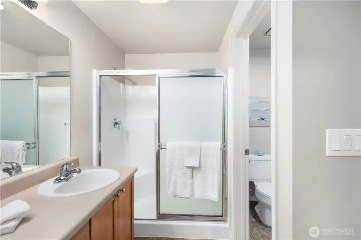 Ensuite with double sinks, full shower and separate water closet
