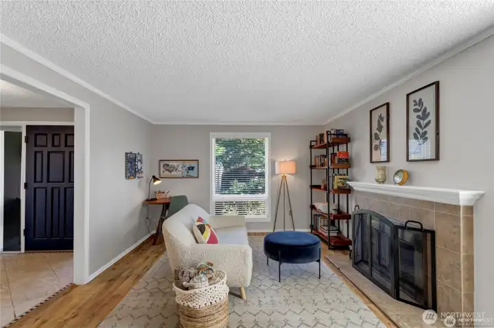 Open Living room space with fireplace