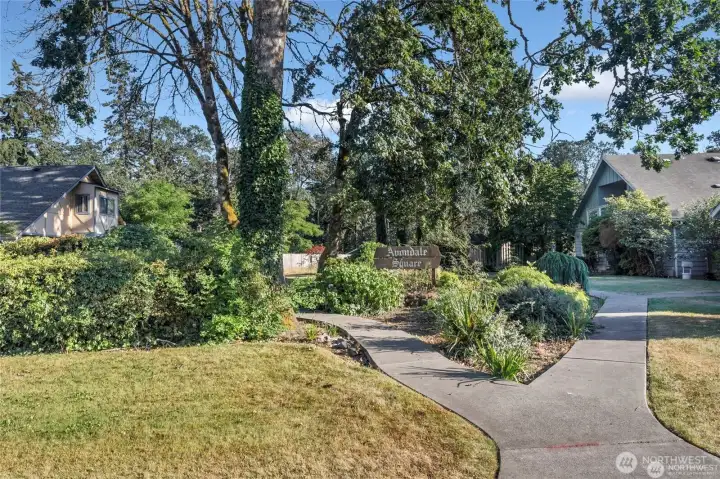 Community has walkways leading to another entrance