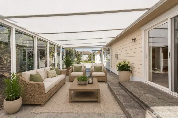 Sunroom for year around outdoor living - Virtually Staged