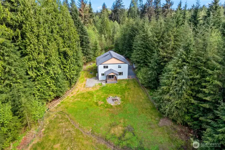 Fully fenced backyard makes for a great hobby farm ando or a great playground for pets!