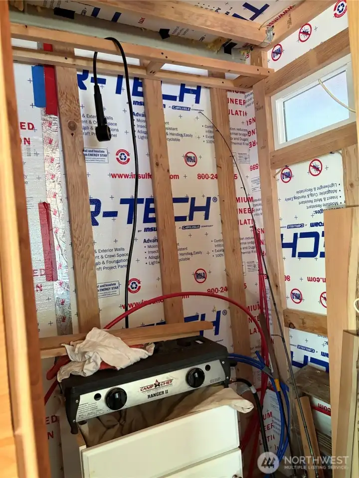 Unfinished space in the end of cabin.
