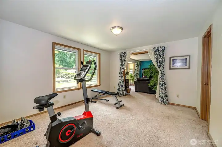 Third upper bedroom currently used as a work out area.