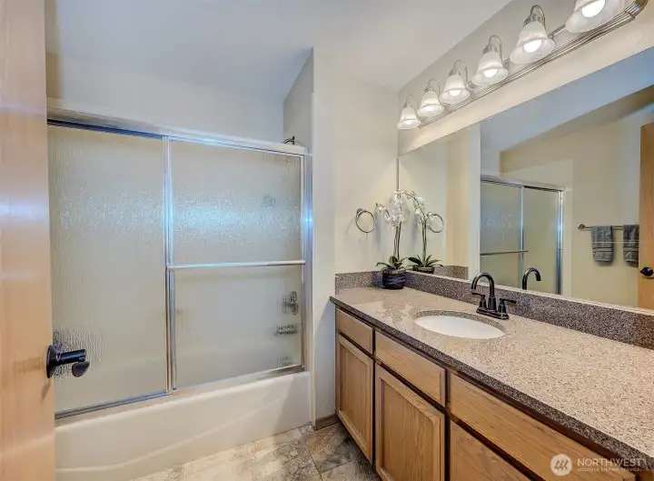 Second upper full bathroom.