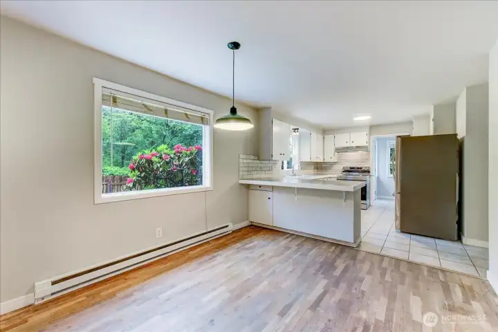 dining room open to the bright kitchen dining room open to the bright kitchen