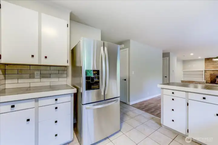 Stainless appliances and tile floors for easy maintenance Stainless appliances and tile floors for easy maintenance