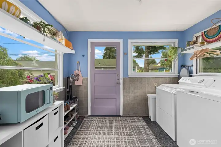 The utility room is right off the kitchen.